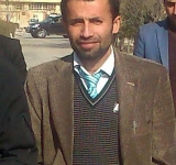 Bombings near Afghanistan Parliament kill TV journalist, woman employee